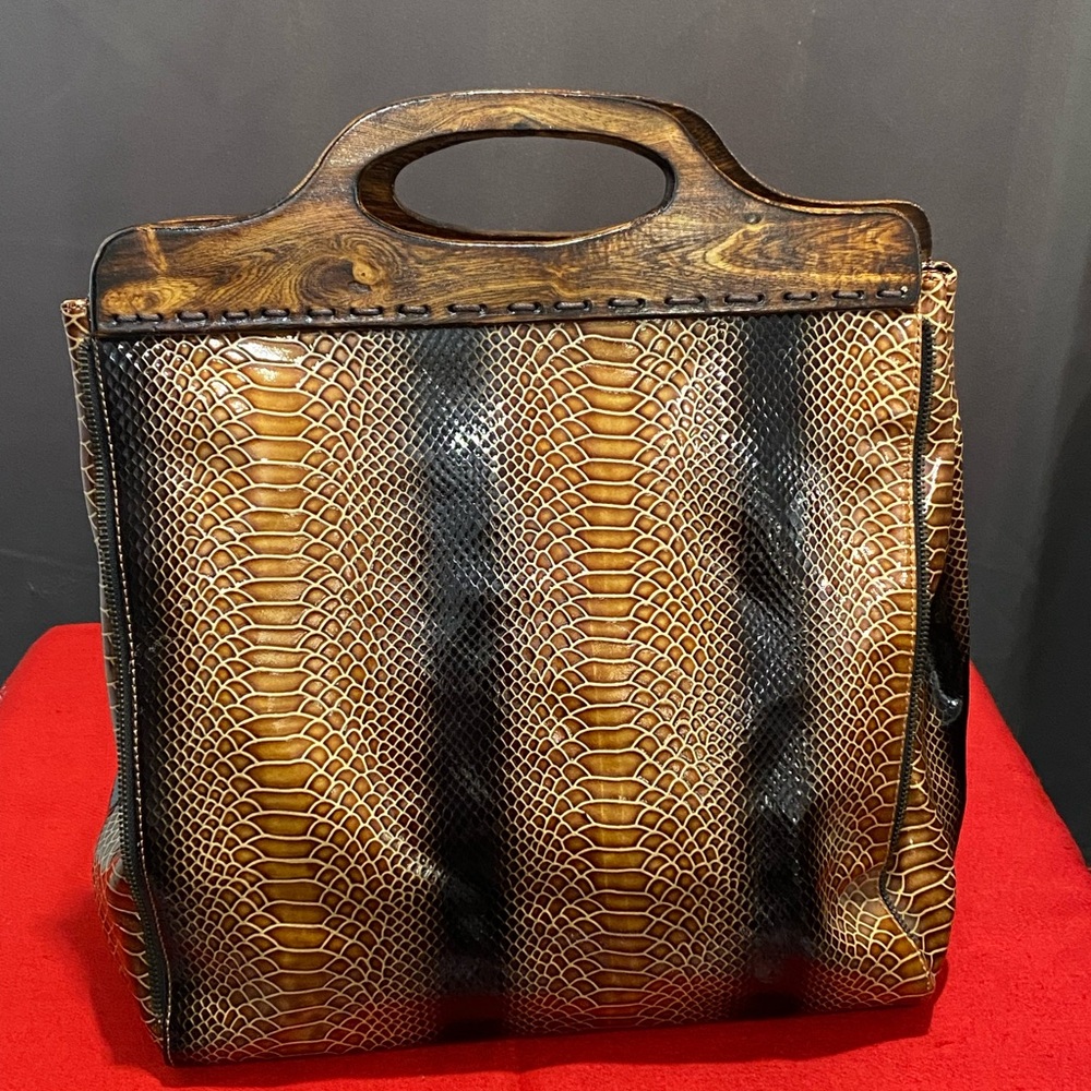 Charlie Lapson top handle clutch bag